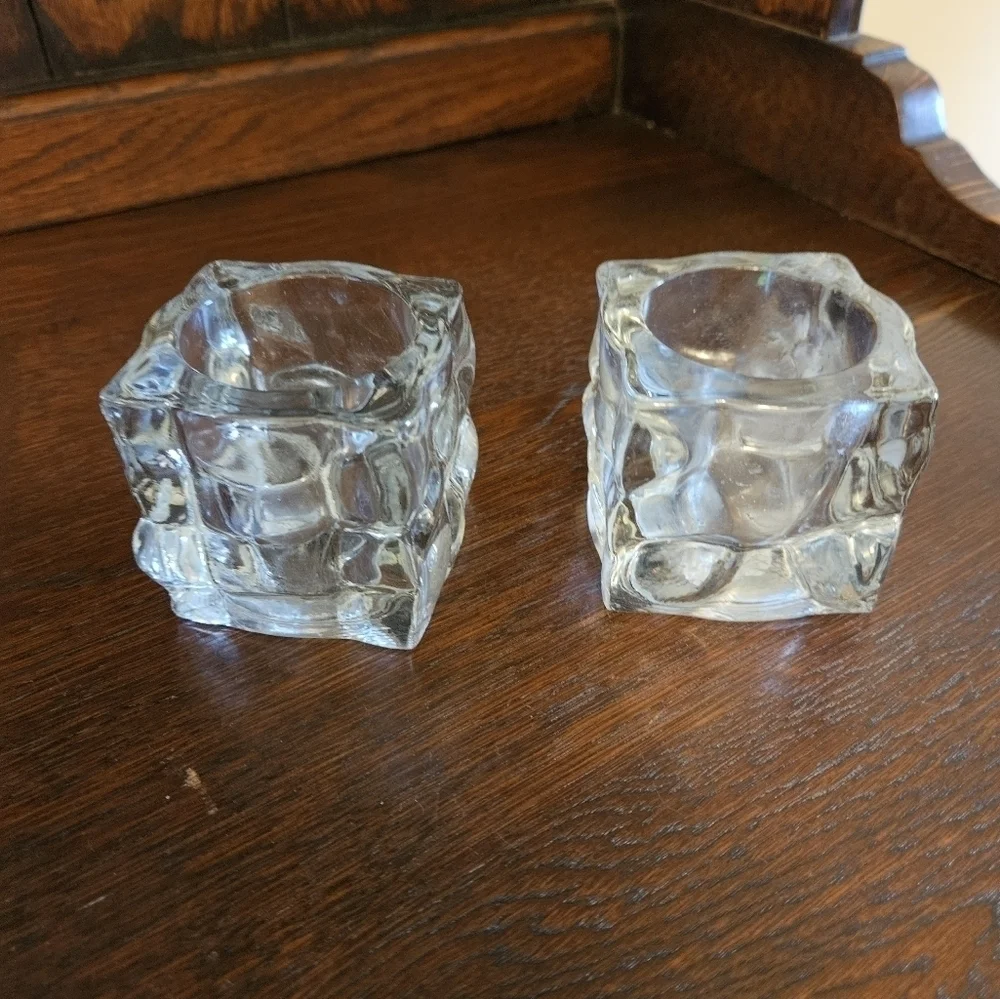 Glass ice cube candle votives.